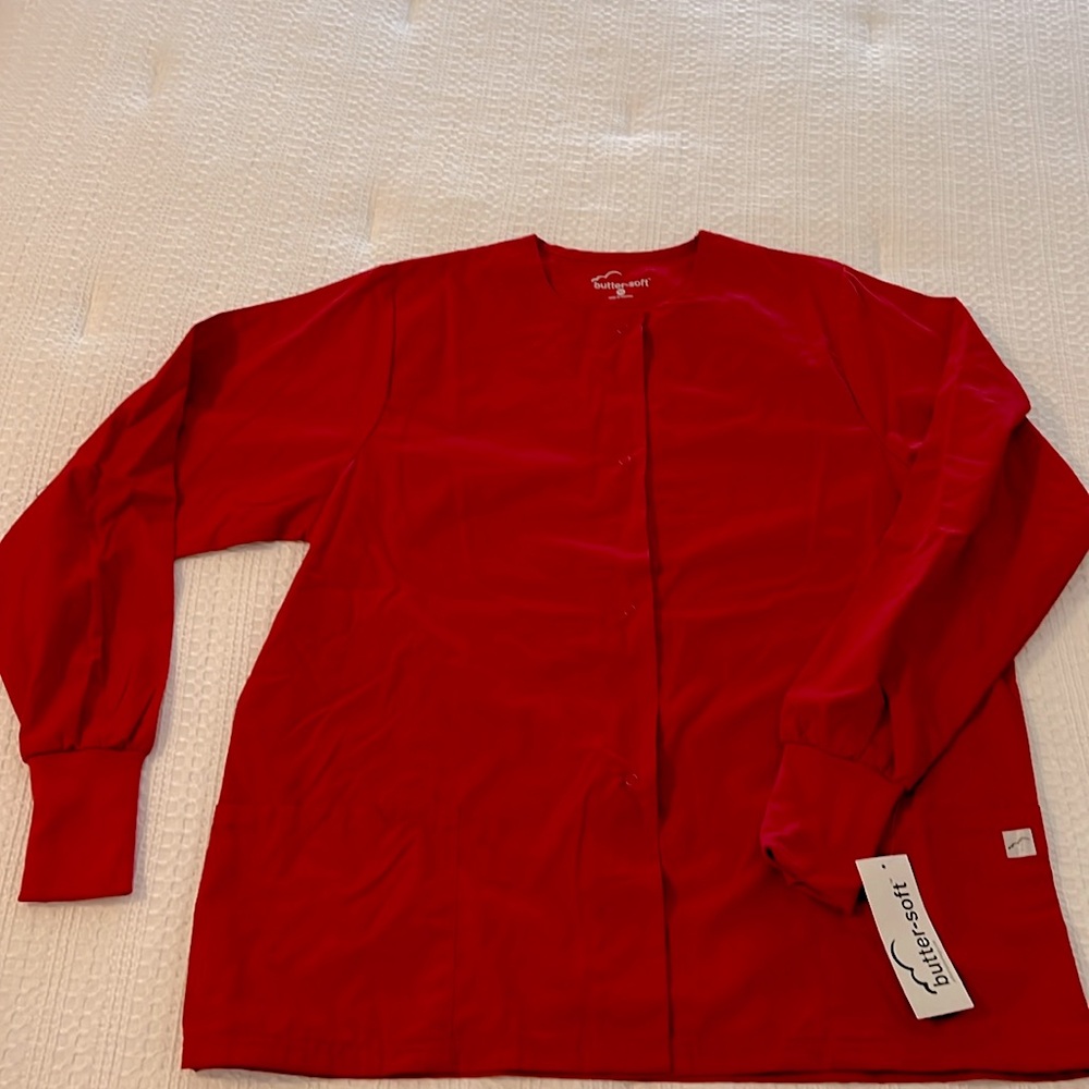 Scrub jacket with snap button closure, round neck, rib knit cuff, 2 front pocket